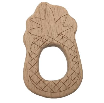 China Toy Wholesales Custom Shape Organic Soft Beech Wooden Ring Rattle Baby Teether Toys Pineapple for sale