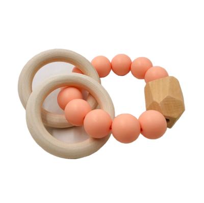 China Hot Selling Beech Non-Toxic Amazon DIY Baby Care Bracelet Wooden Teether Chewing Beads Teething Rattle Toys for sale