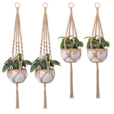 China Europe Wholesale Indoor Outdoor Hanging Hemp Rope Macrame Plant Hangers For Home Decoration for sale