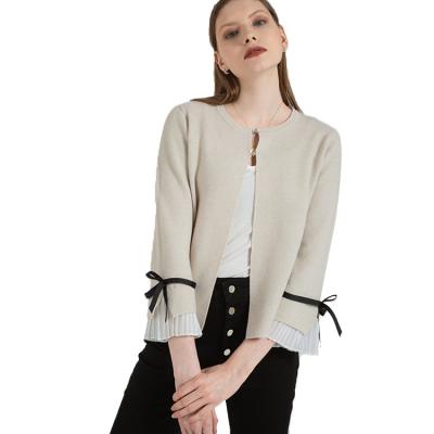 China Hot Element High Cost-effective High Level Anti-wrinkle Fashion Beige Round Neck Cardigan Sweater Women for sale