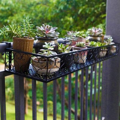 China Indoor Cast Iron Balcony Rack Hanging Plant Rack Display Flower Pot Shelf for sale