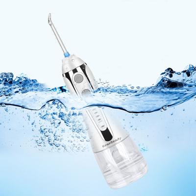 China 2022 New Handheld Portable Home Water Flosser Waterproof 300ML Electric Oral Jet Teeth Whitening Irrigator 2000mAh for sale