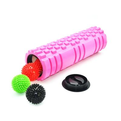 China Portable Custom Design Fitness Gym Hollow EVA Massage Foam Roller With Cap For Muscle Relax for sale