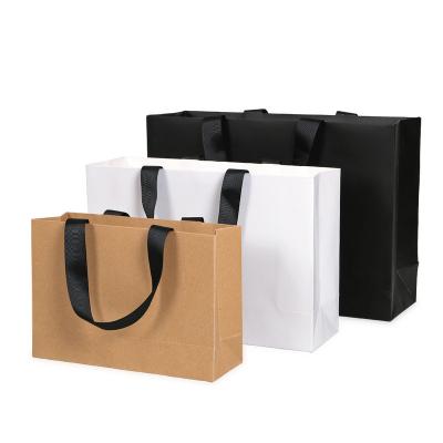 China Recycled Materials Recyclable Kraft Paper Bag With Own Logo Custom Shopping Paper Bag For Food With Handle Take Away Bag for sale