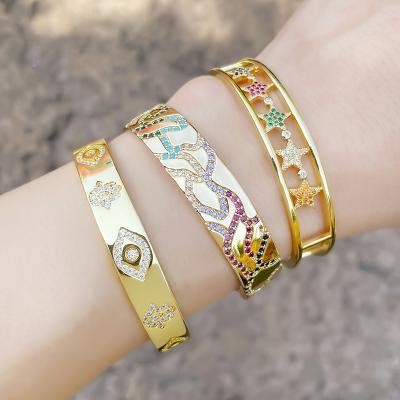 China Vintage European and American wide-brimmed gold personality new bangle hollow eye bracelet for women wholesale for sale