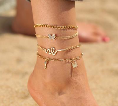 China Vintage Alloy Anklet Set Retro Personality Snake Chain Butterfly Lock 4-Piece Combination Anklet for sale