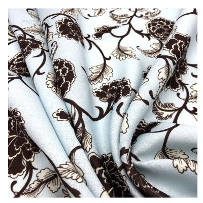 China Memory flower pattern printed 100% polyester fabric imitation linen tela for sale