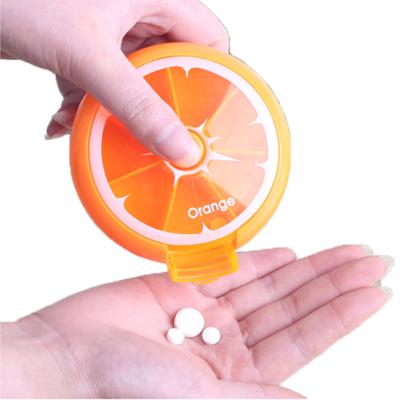 China Beautiful 7 Compartment Fruit Shape Pill Box 7 Day Around Tray Medicine Vitamins Container for sale