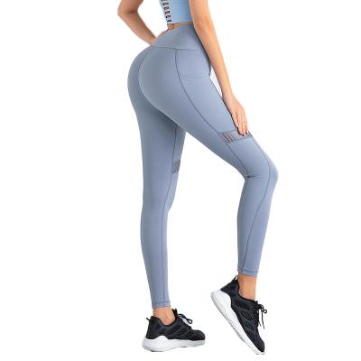 China Breathable Women's High Waist Mesh Reflective Gym Fitness Yoga Pants With Pocket for sale