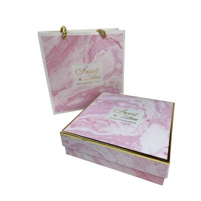 China Recyclable Luxury Cosmetic Packaging Box Paper Shopping Bag Luxury Packaging Box for sale