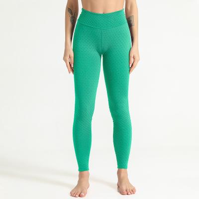 China Seamless new sexy hip high-bounce tight pants sports running fitness pants Jacquard yoga pants for sale