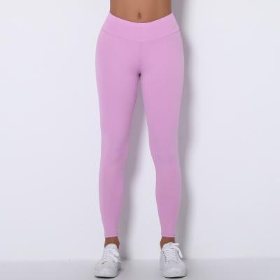 China Wrinkled yoga pants peach slim-fit hip-lifting yoga leggings nude running pants woman for sale