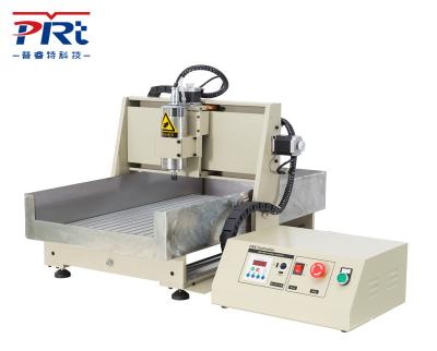 China PURUITEKEJI 6040-2.2KW Metal Round Rail Engraving Machine CNC Router Carving Milling for Metal and Wood for sale