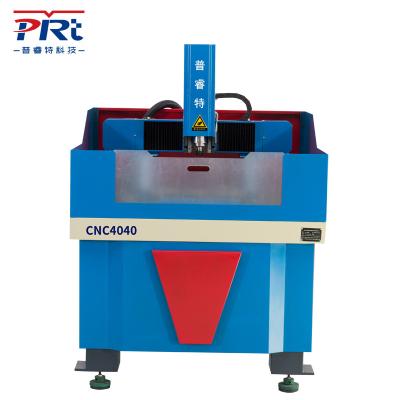 China PURUITEKEJI 4040-1.5KW Stone Metal/Cast CNC Engraving Machine 3 Axis Cutting CNC Router Milling Metal for sale