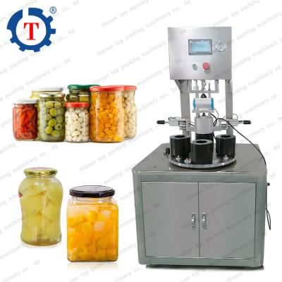 China Food Glass Bottle With Mental Capping Machine Vacuum Cover Sealing Capping Machine for sale