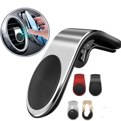 China Mini Magnetic Adjustable Car Phone Holder Suitable For All Models Phone On The Market Clip On Air Vent Black Silver Color for sale