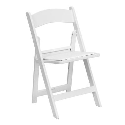 China Modern Outdoor White Padded Plastic Garden Wedding Folding Chair for sale