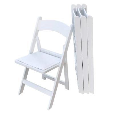 China Modern White Plastic Padded Folding Chair Event Wedding Restaurant Chair for sale