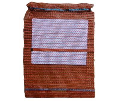 China Other Factory Price 25x39cm PE Handle Raschel Mesh Bag For Packing Fruits And Vegetables for sale