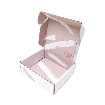 China Recyclable Custom Logo Corrugated Shipping Cosmetic Packaging Box White Logo Skin Care Packaging Box for sale