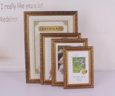 China Simple Home Plastic Frame Gold Ornament Plastic Photo Frame for sale