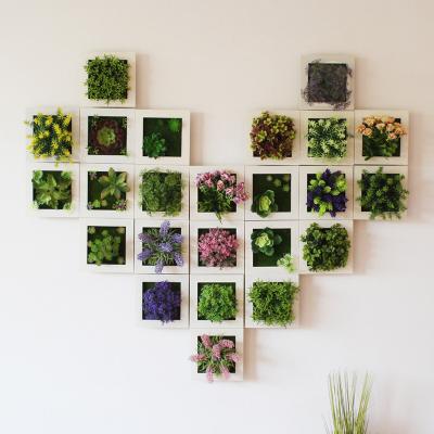 China Simulation Decorative Plant Wall Hanging Artificial Flower Photo Frame for sale