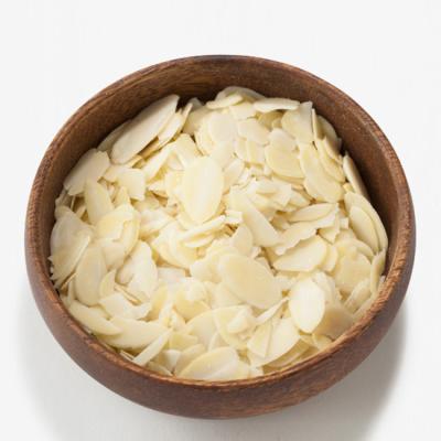 China Dried High Quality Bulk Dehydrated Garlic Flakes Slice Garlic Flakes for sale