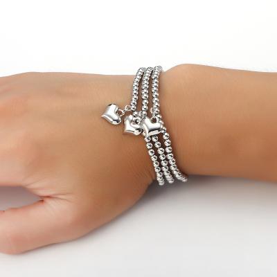 China Amazon FASHIONABLE Popular Stainless Steel Round Beads Elastic Heart Charm Bracelet for sale