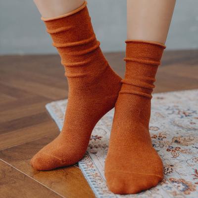 China Spring QUICK DRY fashion comfortable jacquard letter socks custom design girls socks for sale