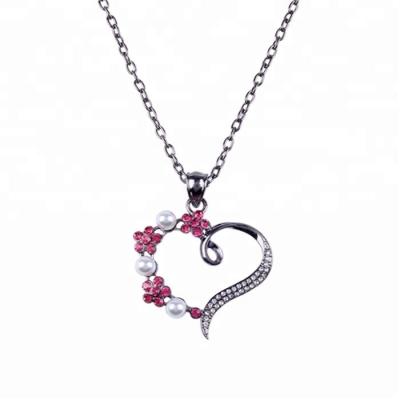 China Fashionable Lady's zinc alloy gun black main crystal and faux stone imitation pearl heart-shaped pendant necklace for sale