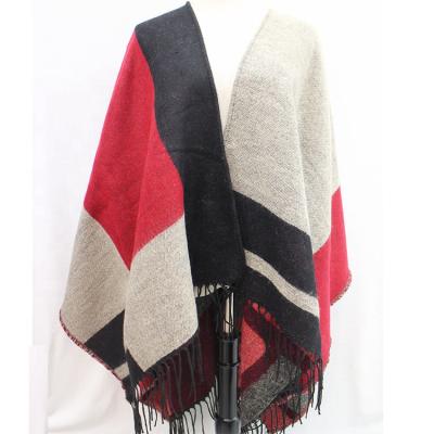 China Factory Custom Made High Quality Acrylic Cheap Woven Women's Poncho Woven Winter Warm Cloak Ladies' Shawls With Tassels for sale