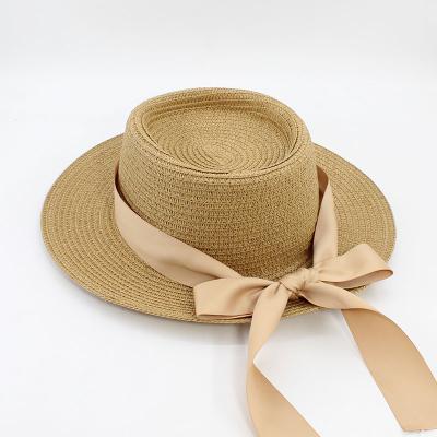 China Character Summer Straw Hat For Womens Beach Sun Hat With Bowknot Stripe Flat Surface for sale