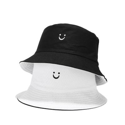 China 2021 Double Sided Character Design Hip Hop Hat Embroidered Smiling Bucket Hat for sale