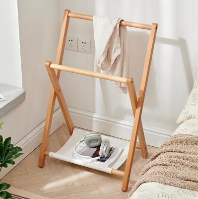 China (Others) Simple and Modern Adjustable Rack Bamboo Covering Clothes Rack Simple Household Install Clothes Rack for sale