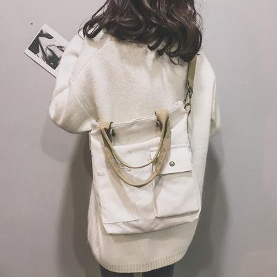 China 2021 Summer Fashion New Korean Messenger Tote Canvas Bags Belt Decoration Shoulder Bag for sale