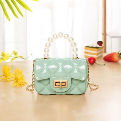 China Waterproof Mini Chain Key Case Lingge Handbag For Kids 2021 Fashion New PVC Coin Jelly Bag Wholesale Purse for sale