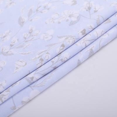 China Sustainable Baby Blue White Flower Pattern ITY Polyester Span Knit Thick Stretch Jersey Fabric Wholesale for sale