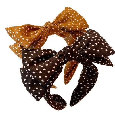 China Hair Accessories All-match Concise Polka Dots Love Soft Wide Bow Cutout Headband Edge Hair Accessories Hair Band for sale