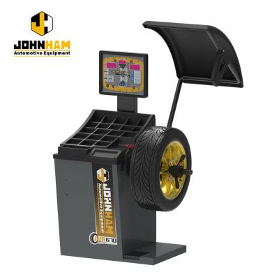 China Auto Car Wheel Balancer With Hand Lock Automatic Unbalancing Point Searching Wheel Balancing Machine JWB670 JWB670 for sale