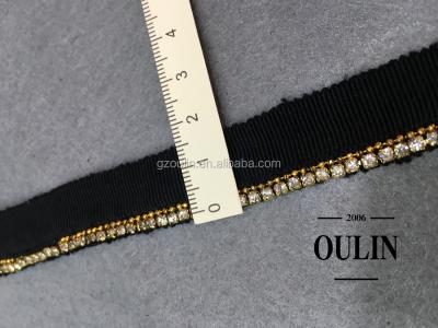 China Sustainable Rhinestone Chain Beaded Lace Fabric Wholesale New Style Rhinestone Chain Lace Trim for sale