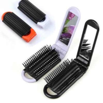 China Travel 1pc Professional Home Hair Comb Portable Folding Hair Brush With Mirror Purse Travel Pocket Comb for sale