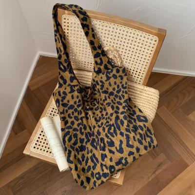 China Leopard Handbag Women Straw Handbag Girls Fashion Striped Shoulder Bag Summer Beach Daily Carry Bag for sale