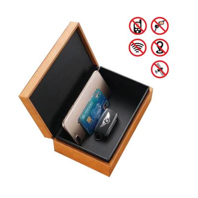 China Anti Theft Magnetic Faraday Car Key Signal Blocker Keyless Box Durable Leather RFID Box Cell Phone With Magnets For Car Key Fobs for sale