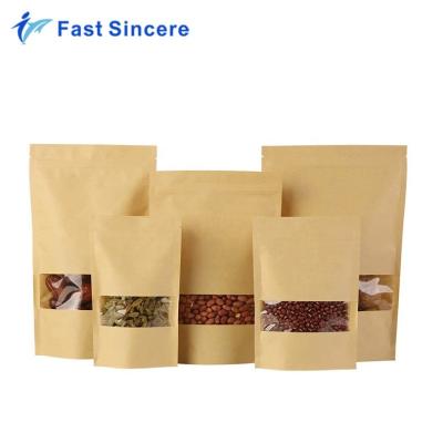 China Moisture Proof Heat Sealed Stand Up Zip Lock Kraft Window Paper Packaging Bag for sale