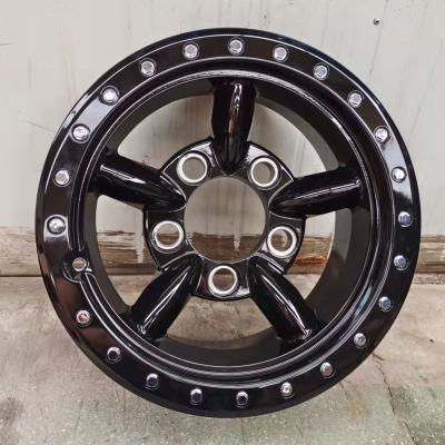 China ALLOY for Land Rover Defender 16*8.0 inch ALLOY WHEEL DESIGN BLACK with rivet for sale