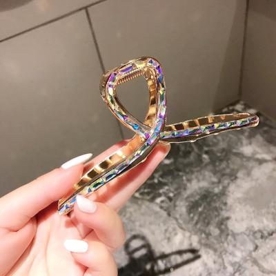 China Minimalist 2021 newcomers fashion girls Korean single jaw big handle rhinestone alloy metal hair claw clip women for sale