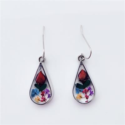 China Europe Hot selling water drop shaped rose dried flower earrings, resin dried flower handicrafts, resin flower earrings wholesale for sale