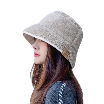 China Custom Logo Wide Brim Adult Fisherman Winter Character Reversible Furry Bucket Hat Rainproof Scrambled Hat for sale