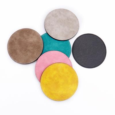 China Viable Colorful Round Shape PU Leather Coasters Sublimation Mug Coaster Empty Design Beer Christmas Coaster for sale