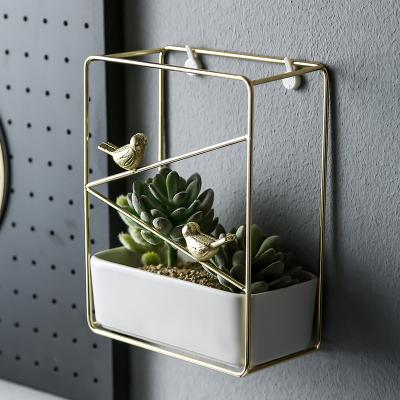 China 2021 Modern Creative Gold Black White Succulent Plants Rack Square Bird Metal Wall Hanging Plant Stand With Ceramic Pot Home Display for sale